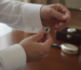how to put on cufflinks